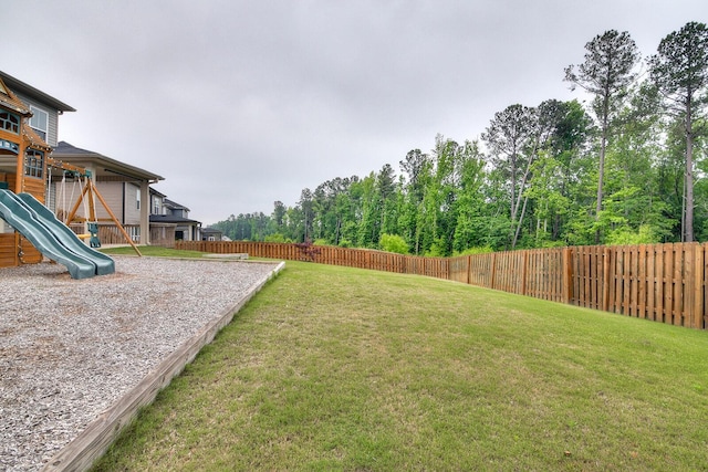 view of yard with a playground