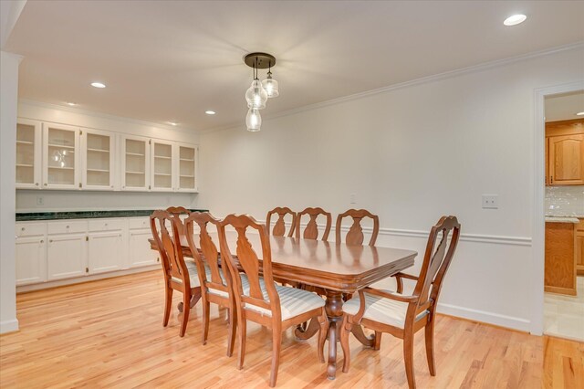 301 Misty Cv, Mccormick, SC 29835 - dining area with crown molding, light wood-style flooring, and recessed lighting