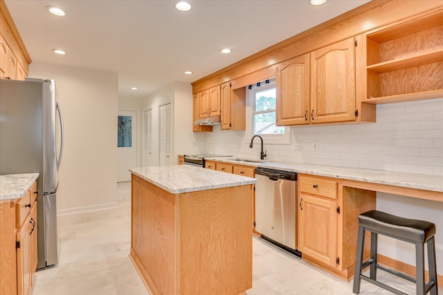301 Misty Cv, Mccormick, SC 29835 - kitchen featuring appliances with stainless steel finishes, a kitchen island, light countertops, decorative backsplash, and recessed lighting