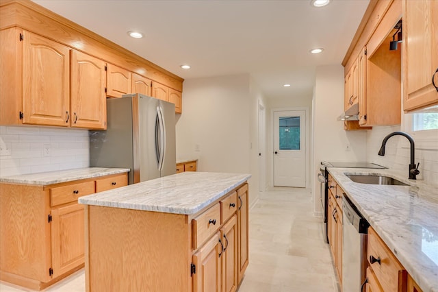 301 Misty Cv, Mccormick, SC 29835 - kitchen featuring stainless steel appliances, light brown cabinetry, light stone countertops, decorative backsplash, and under cabinet range hood
