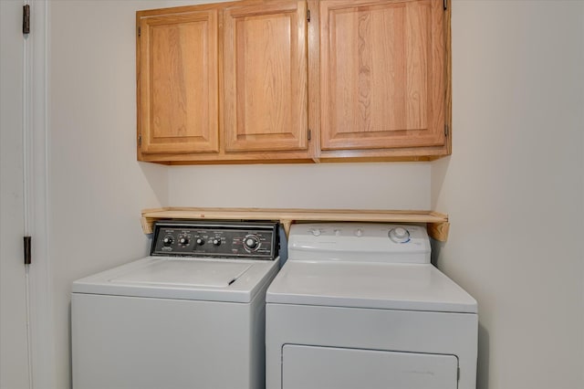 301 Misty Cv, Mccormick, SC 29835 - laundry room with washer and clothes dryer and cabinet space