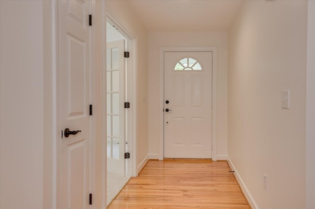 301 Misty Cv, Mccormick, SC 29835 - doorway featuring light wood-type flooring and baseboards