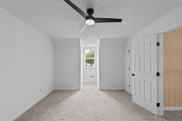 221 Creek View Cir, Martinez, GA 30907 - unfurnished bedroom with a textured ceiling, carpet floors, ceiling fan, and lofted ceiling