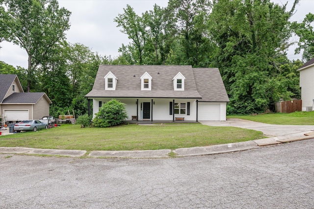 221 Creek View Cir, Martinez, GA 30907 - cape cod home with driveway, an attached garage, and covered porch