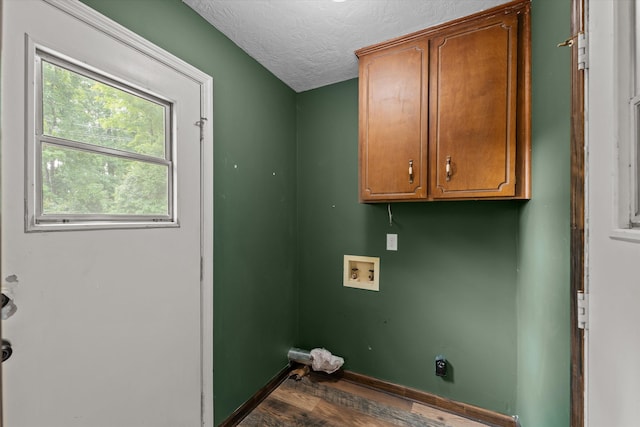 221 Creek View Cir, Martinez, GA 30907 - washroom featuring cabinet space, hookup for a washing machine, dark wood-style flooring, a textured ceiling, and hookup for an electric dryer