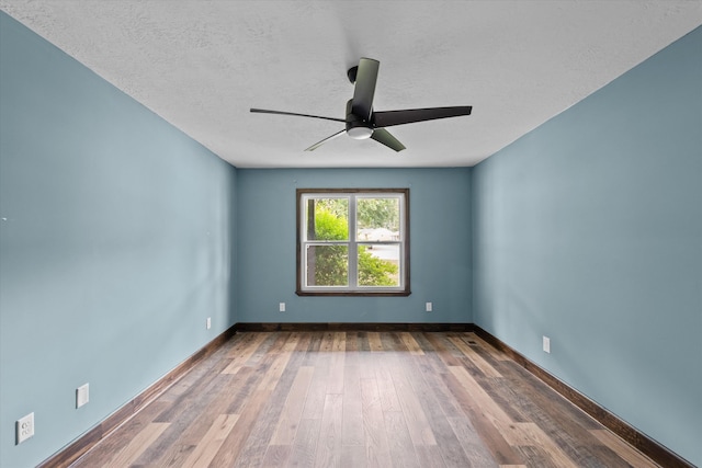 221 Creek View Cir, Martinez, GA 30907 - unfurnished room featuring a ceiling fan, wood finished floors, and a textured ceiling