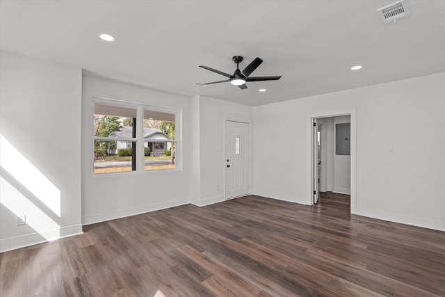 spare room with ceiling fan, recessed lighting, visible vents, baseboards, and dark wood-style floors