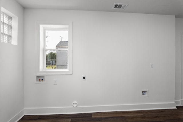 laundry area with baseboards, visible vents, dark wood-style floors, hookup for a washing machine, and hookup for an electric dryer