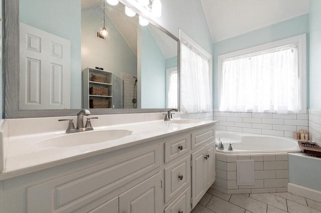 203 Longstreet Xing, North Augusta, SC 29860 - bathroom featuring vaulted ceiling, double vanity, a bath, a tile shower, and marble finish flooring