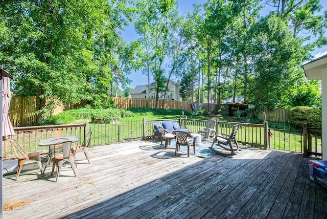 203 Longstreet Xing, North Augusta, SC 29860 - wooden deck featuring a fenced backyard and outdoor dining space