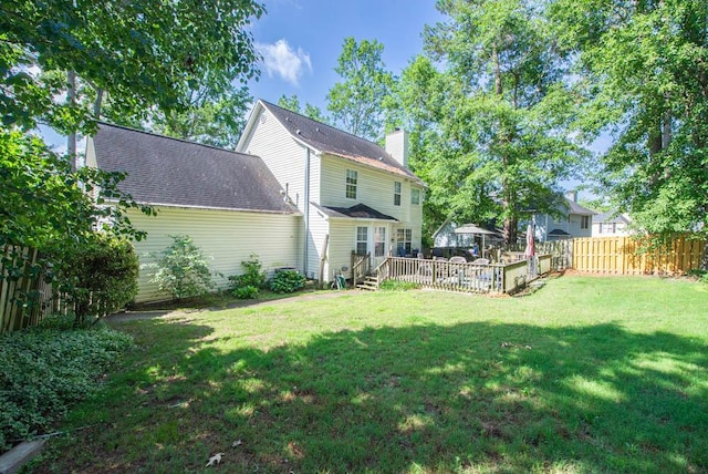 203 Longstreet Xing, North Augusta, SC 29860 - back of house with a chimney, a fenced backyard, and roof with shingles