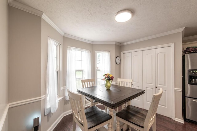 203 Longstreet Xing, North Augusta, SC 29860 - dining space featuring dark wood-style floors, a textured ceiling, and crown molding