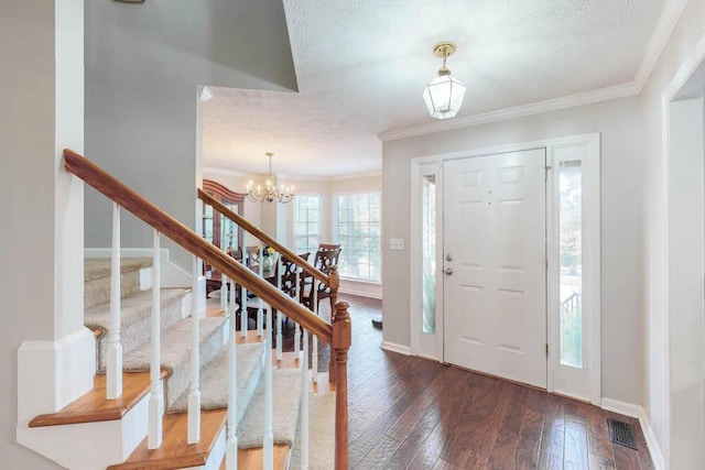 203 Longstreet Xing, North Augusta, SC 29860 - entrance foyer featuring hardwood / wood-style flooring, stairway, a chandelier, crown molding, and a textured ceiling