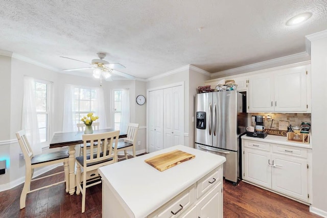 203 Longstreet Xing, North Augusta, SC 29860 - kitchen featuring stainless steel fridge, ceiling fan, dark wood finished floors, white cabinetry, and a textured ceiling