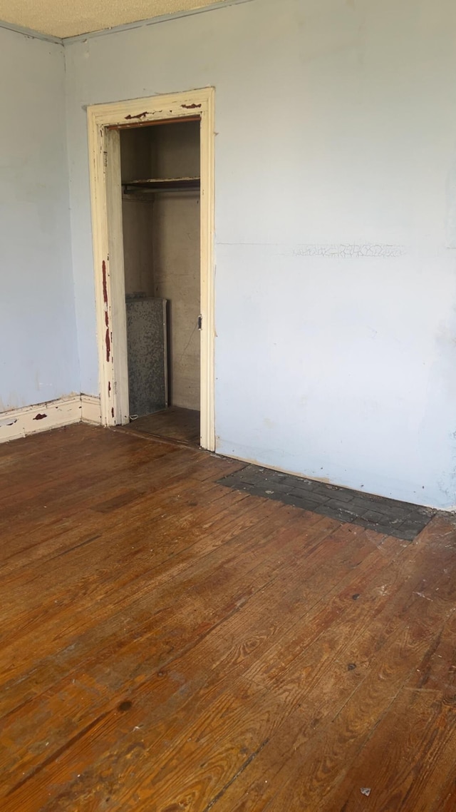 627 Montgomery St, Augusta, GA 30904 - unfurnished bedroom featuring a closet and wood-type flooring