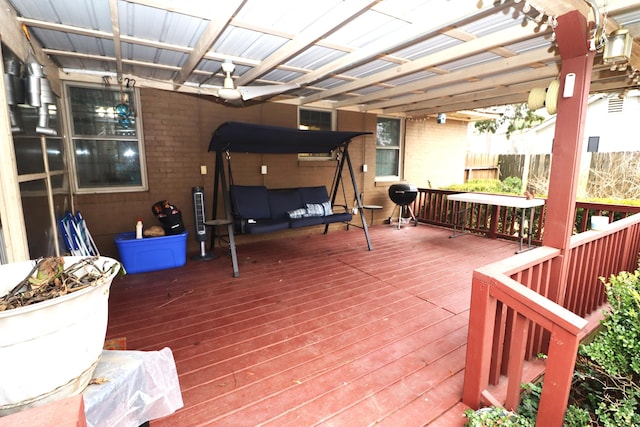 wooden deck with a pergola