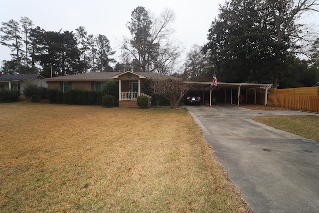 ranch-style house with a front lawn and a carport