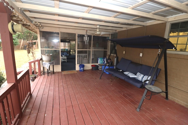 deck featuring ceiling fan, a pergola, and an outdoor living space