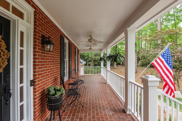 deck featuring a porch and ceiling fan