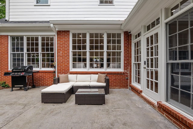 view of patio featuring french doors, an outdoor living space, and a grill