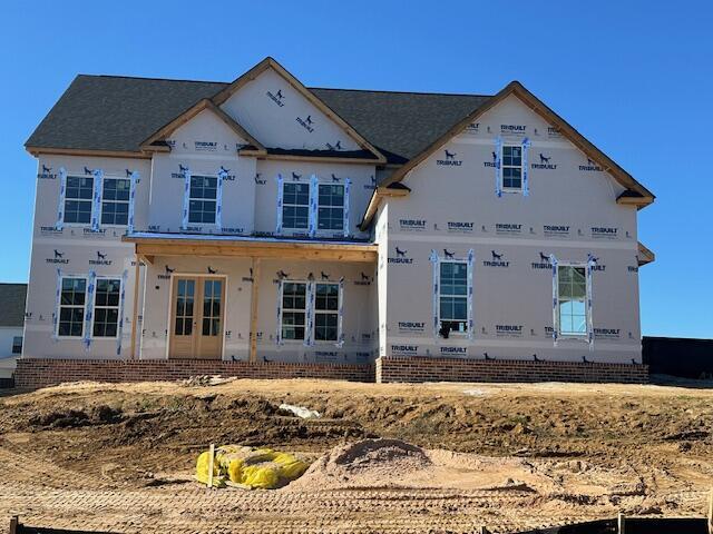 property in mid-construction featuring french doors