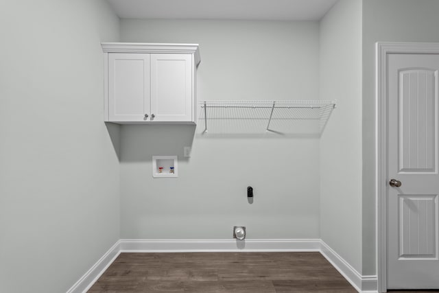 laundry area with electric dryer hookup, dark hardwood / wood-style flooring, and hookup for a washing machine