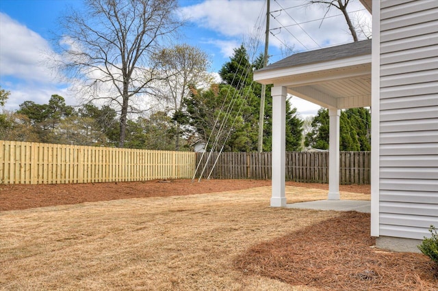 view of yard with a fenced backyard