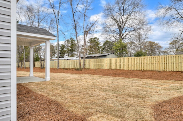 view of yard featuring a fenced backyard