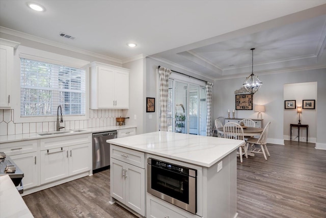 147 Shenandoah Dr, Mccormick, SC 29835 - kitchen featuring pendant lighting, sink, dark wood-type flooring, appliances with stainless steel finishes, and white cabinets