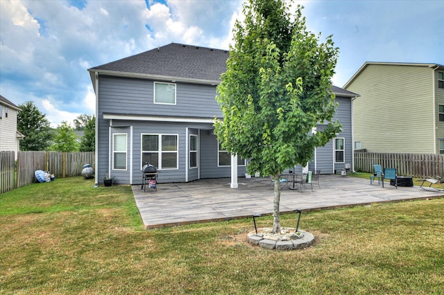 825 Burch Creek Dr, Grovetown, GA 30813 - back of house featuring a fenced backyard, a wooden deck, and a shingled roof