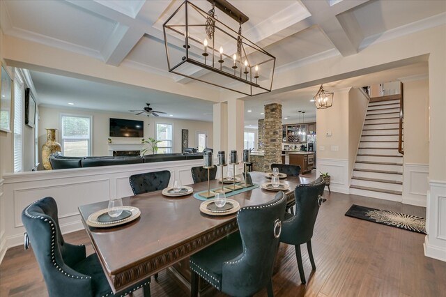 825 Burch Creek Dr, Grovetown, GA 30813 - dining space featuring coffered ceiling, beamed ceiling, wood finished floors, wainscoting, and stairway