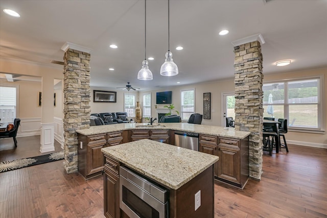 825 Burch Creek Dr, Grovetown, GA 30813 - kitchen with ornate columns, appliances with stainless steel finishes, ornamental molding, a center island, and open floor plan