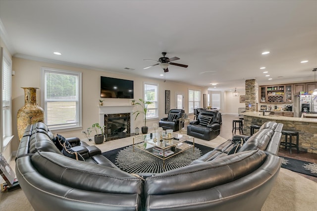 825 Burch Creek Dr, Grovetown, GA 30813 - living room with a fireplace, a ceiling fan, recessed lighting, crown molding, and healthy amount of natural light