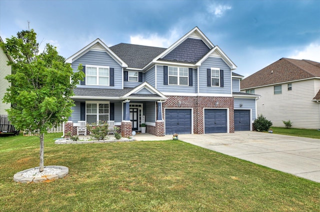825 Burch Creek Dr, Grovetown, GA 30813 - craftsman inspired home with a garage, a porch, brick siding, driveway, and a front yard