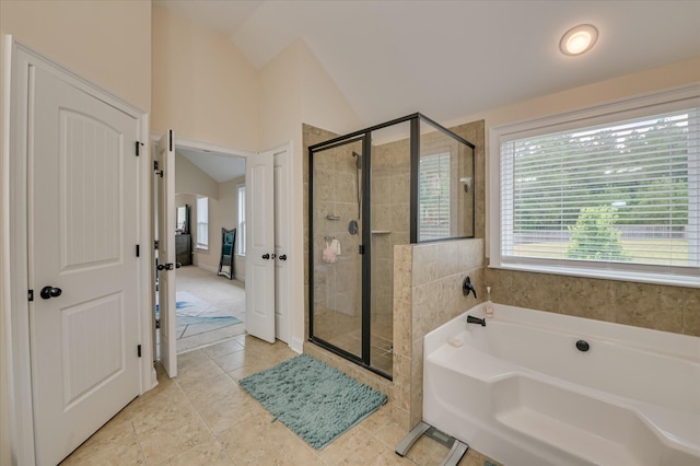 825 Burch Creek Dr, Grovetown, GA 30813 - full bathroom with a garden tub, vaulted ceiling, a stall shower, and tile patterned floors