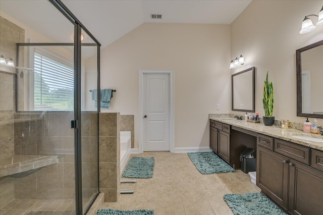 825 Burch Creek Dr, Grovetown, GA 30813 - full bathroom featuring double vanity, a stall shower, a garden tub, lofted ceiling, and tile patterned flooring