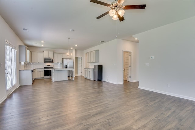 830 Otto Run, North Augusta, SC 29860 - unfurnished living room featuring a sink, a ceiling fan, baseboards, wood finished floors, and recessed lighting
