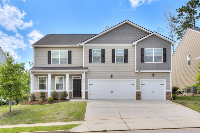 830 Otto Run, North Augusta, SC 29860 - craftsman-style house featuring an attached garage, driveway, a front yard, and stone siding