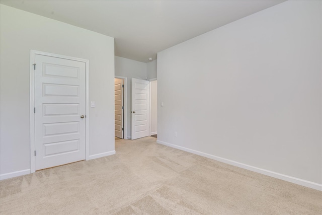 830 Otto Run, North Augusta, SC 29860 - unfurnished bedroom with light colored carpet, baseboards, and a spacious closet