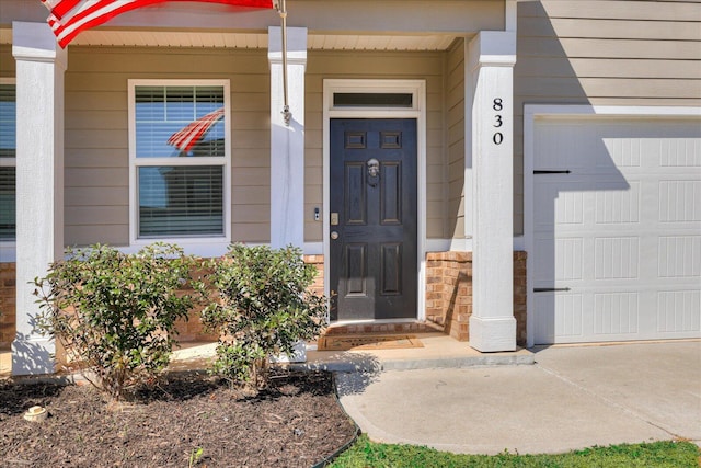 property entrance with a garage