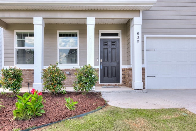 830 Otto Run, North Augusta, SC 29860 - property entrance featuring covered porch and an attached garage