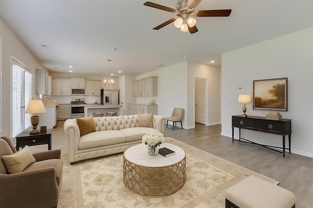 830 Otto Run, North Augusta, SC 29860 - living area with light wood-type flooring, ceiling fan, recessed lighting, and baseboards