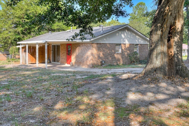 view of front of property with a patio