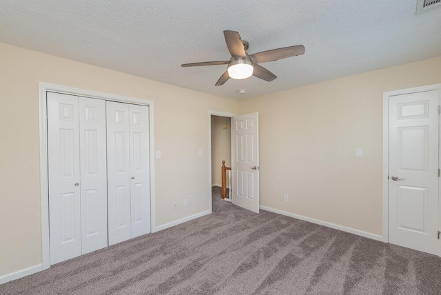 2119 Turtle Ct, Augusta, GA 30907 - unfurnished bedroom with carpet flooring, a closet, a textured ceiling, and ceiling fan