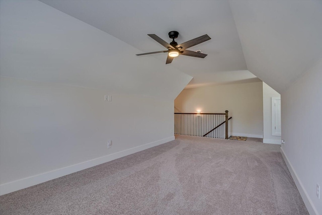 bonus room with carpet flooring, ceiling fan, and lofted ceiling