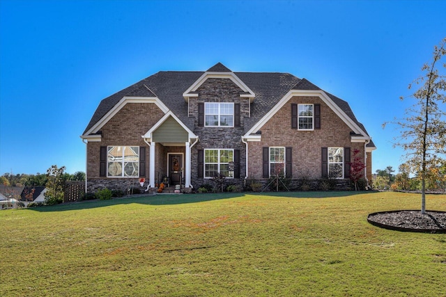 craftsman house with a front lawn