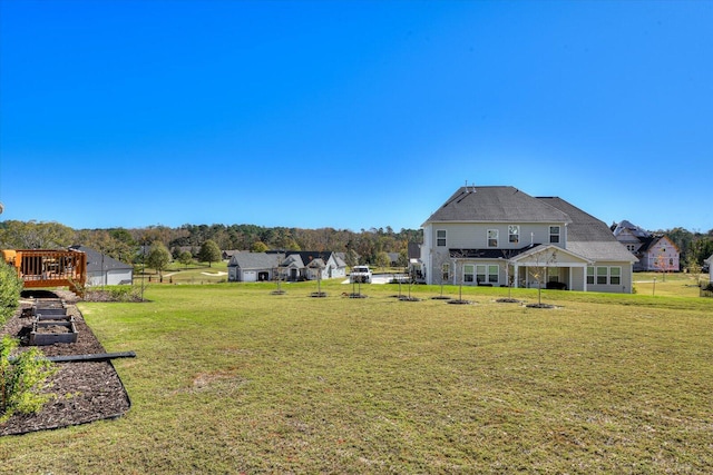 view of yard featuring a deck