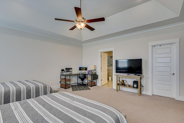 bedroom with crown molding, vaulted ceiling, ensuite bath, ceiling fan, and light colored carpet