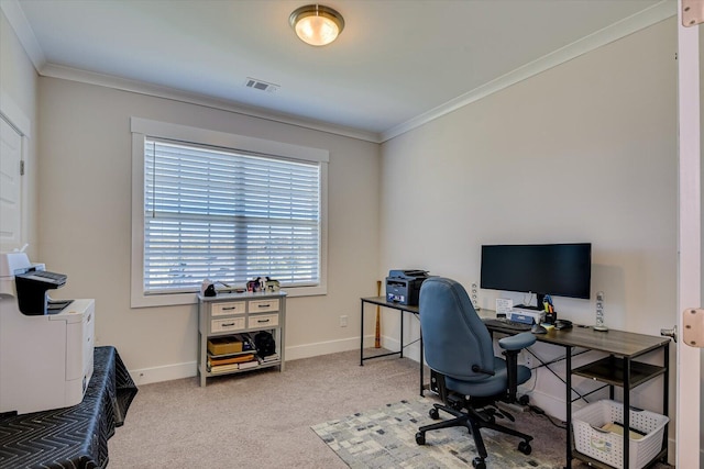 carpeted home office featuring crown molding