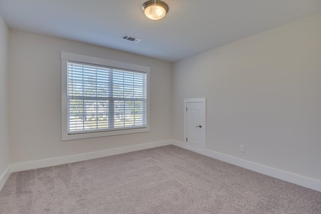 empty room with light carpet